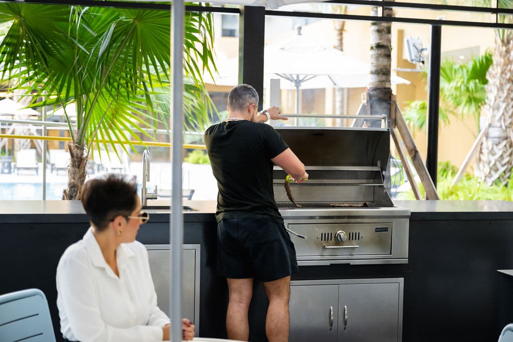 Couple at the outdoor grill at Metro Parc